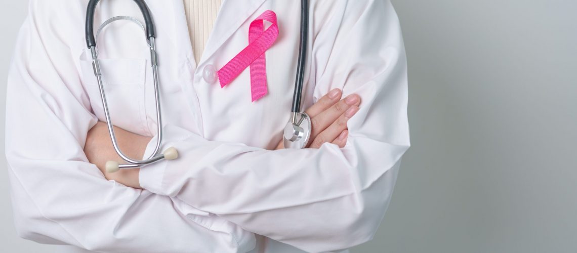Pink,October,Breast,Cancer,Awareness,Month,,Doctor,With,Pink,Ribbon