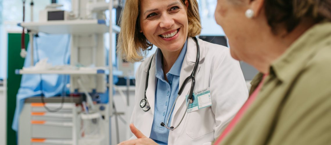 Geriatrician,Talking,About,Test,Results,With,Senior,Patient,During,Check-up.